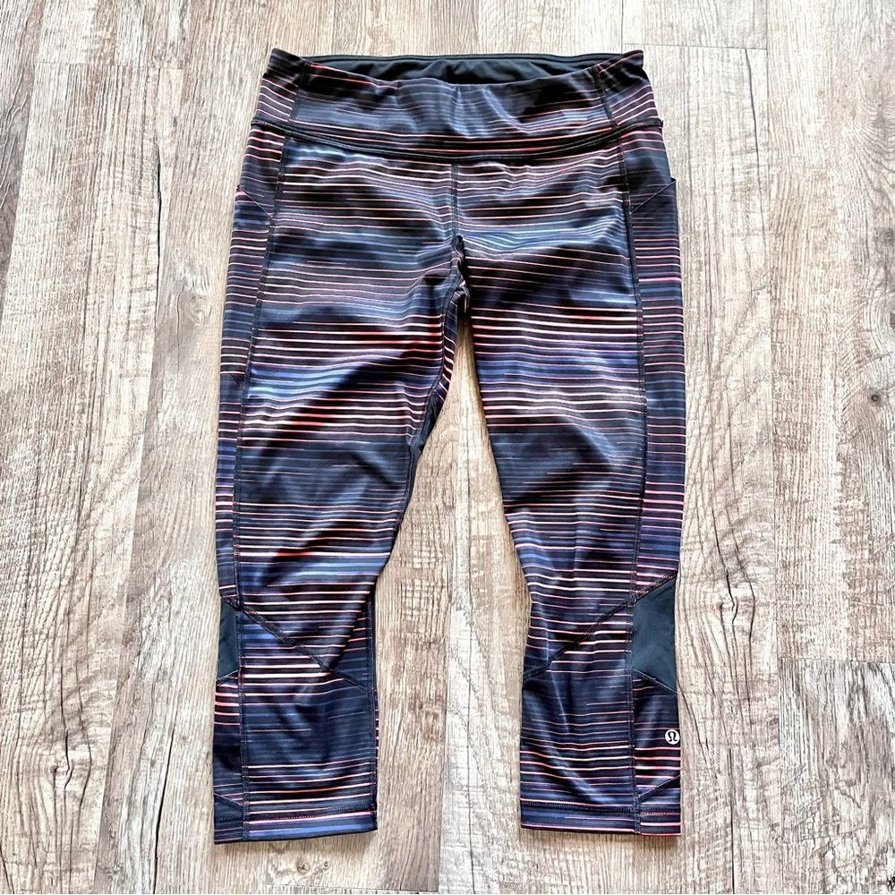 Lululemon athletic Capri leggings, black red blue stripes size 10
